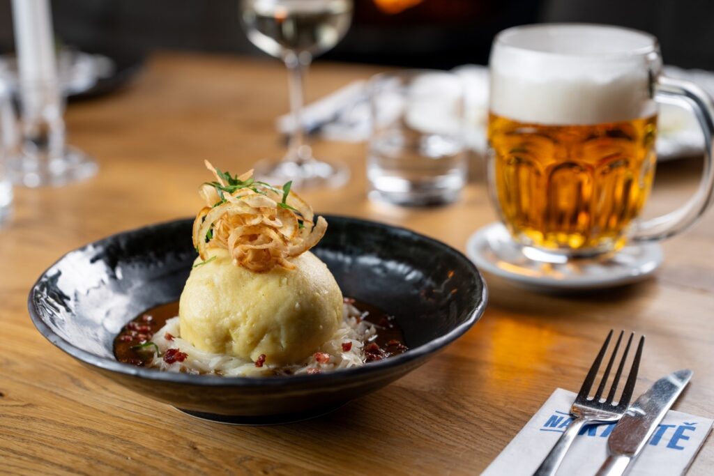 Plněný bramborový knedlík  aneb "blboun" v podání restaurace Na Krétě. Česká klasika, kterou jsme dovedli k dokonalosti.